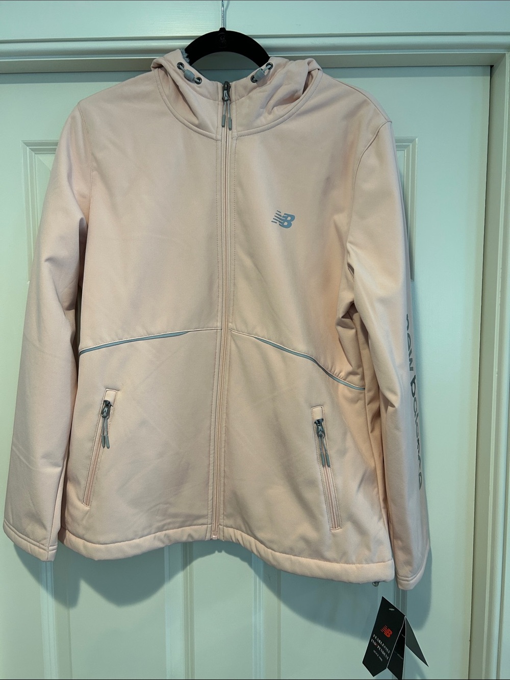 New Balance Women’s Light Pink Hooded Jacket